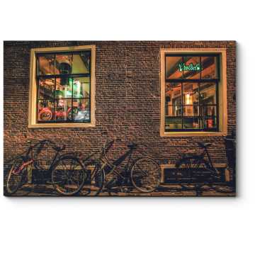 Модульная картина Велосипеды у кирпичной стены амстердамского паба
